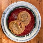 Cherry Cookies on a red and gray plate. The recipe came from Rike's Department Store in Dayton, Ohio. Grams got the recipe from their bakers.