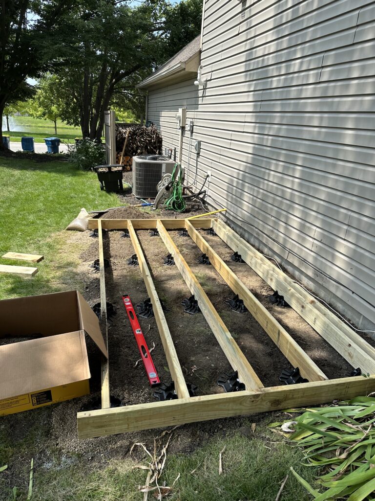 Inner rows of TuffBlocks in place with floor joists fit and ready to go